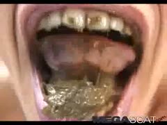 MILF shows her mouth filled with nasty poop on live